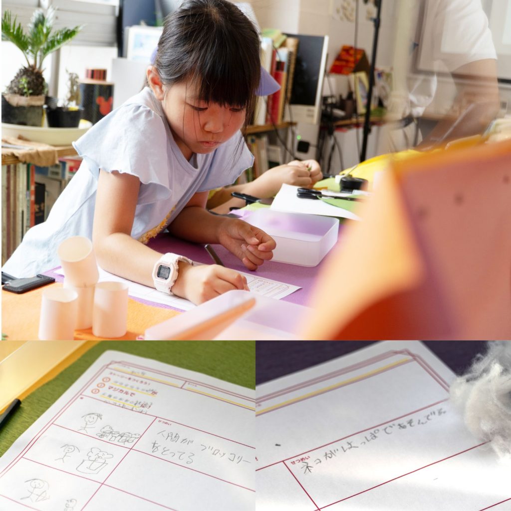 子どもたちが絵コンテにストーリーを書き込んでいる様子